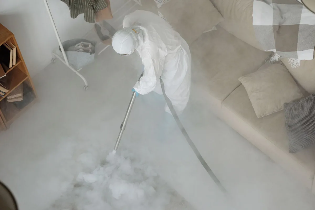 Biohazard cleanup technician in protective equipment, Baldwin, NY